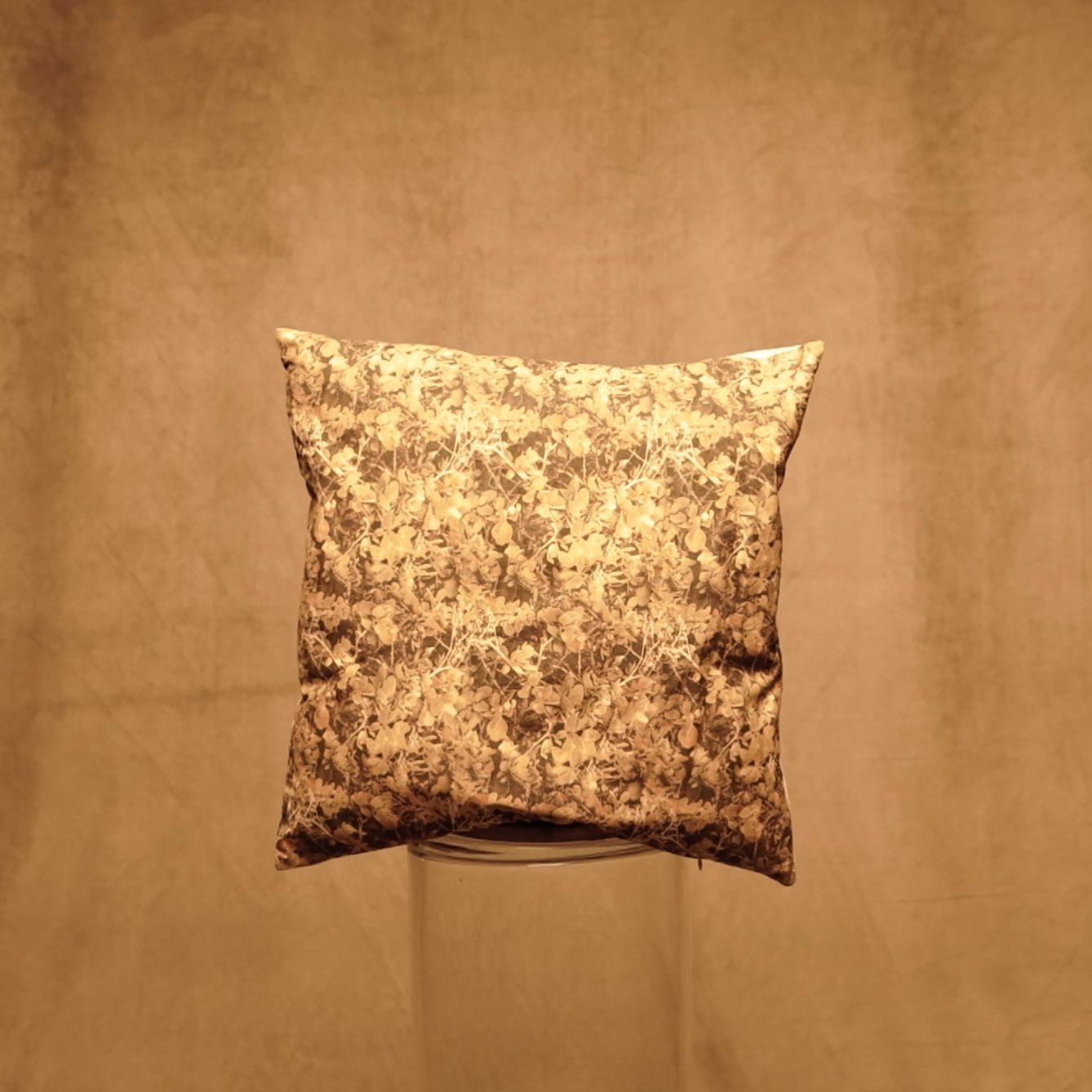 Boho style floral decorative cushion in natural tones