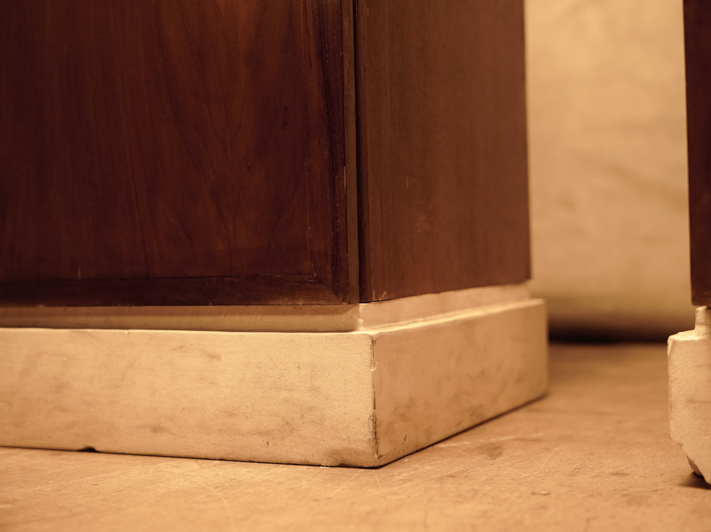 Teak pedestal and limestone base with interior shelves