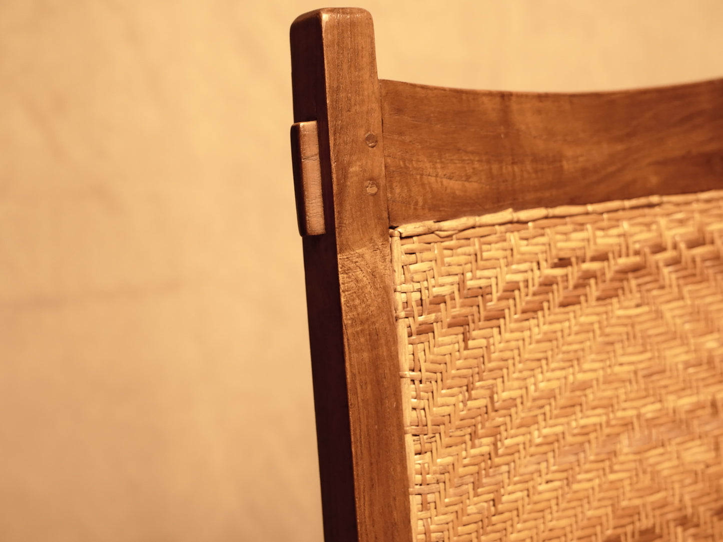 Vintage style handcrafted chair made of wood and natural rattan