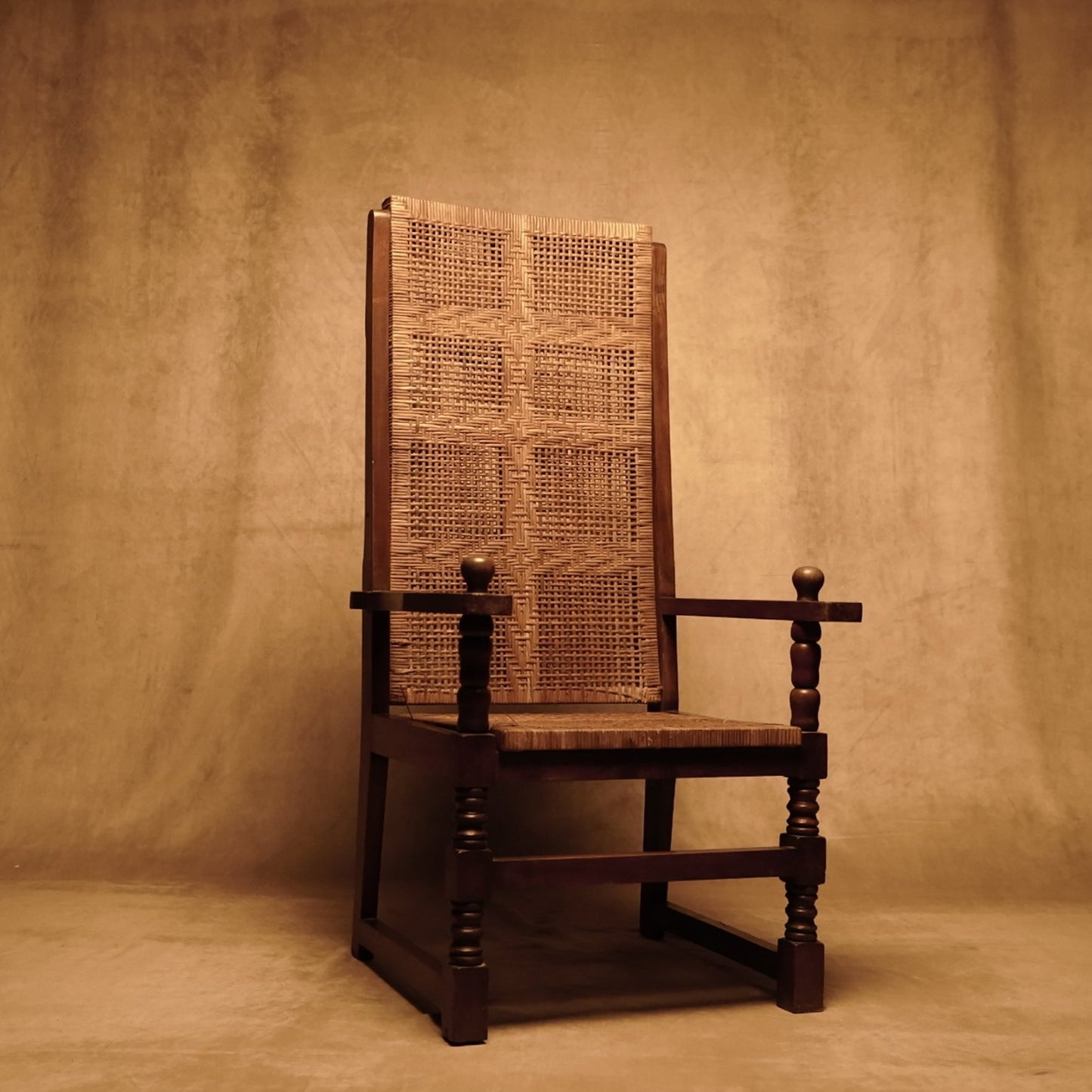 Antique chair made of natural wood with braided seat