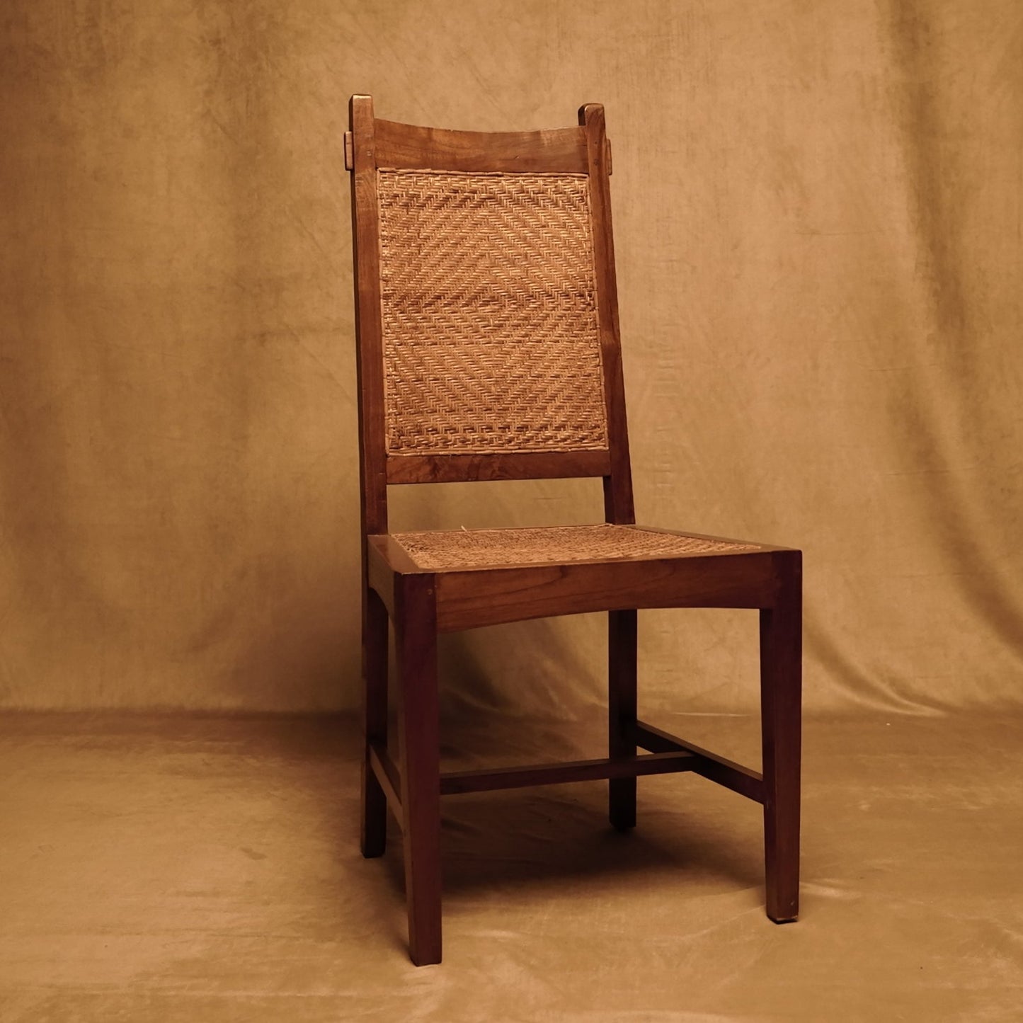 Vintage style handcrafted chair made of wood and natural rattan