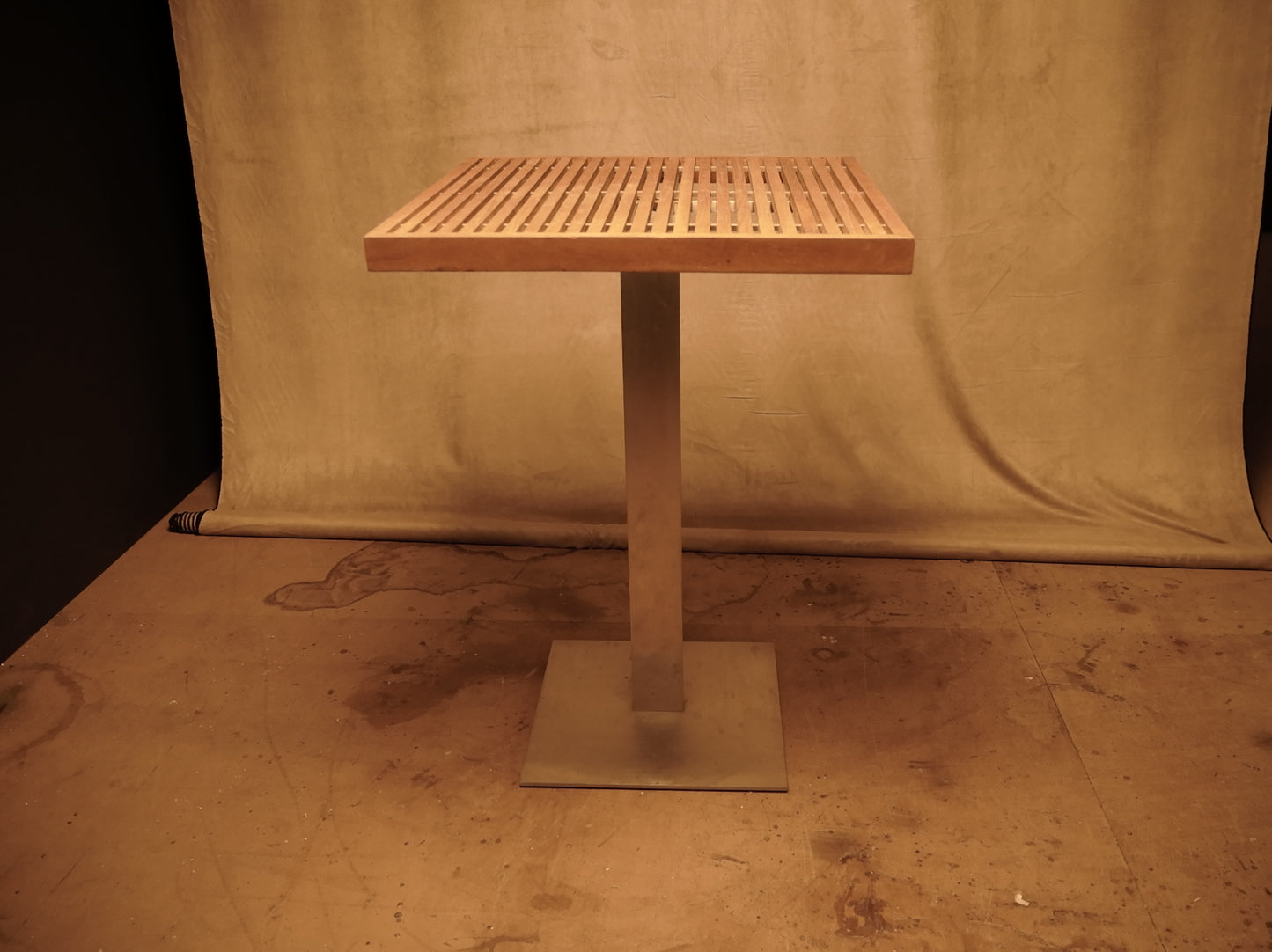 Outdoor high table made of premium teak and naval steel