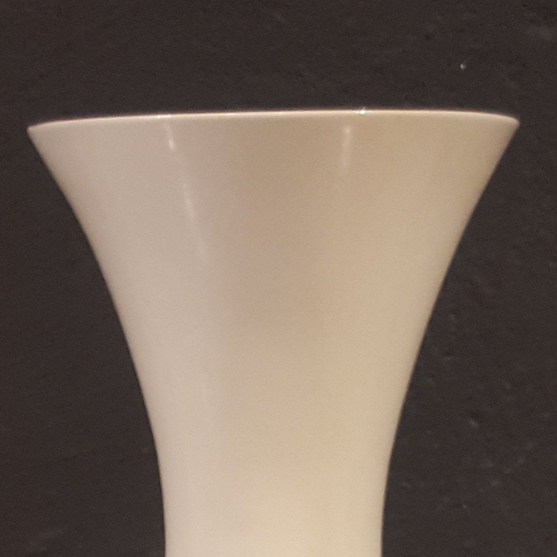 White concave ceramic vase