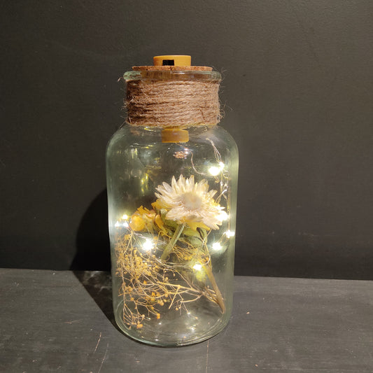 Jarra con luces led y flores artificiales