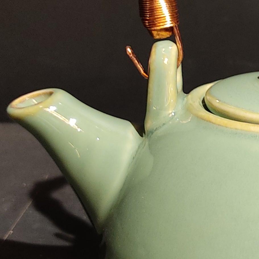 Green stoneware teapot