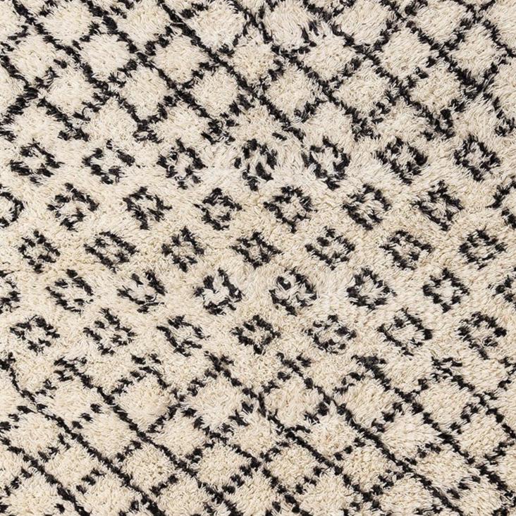 Handcrafted wool rug with ethnic style in black and white
