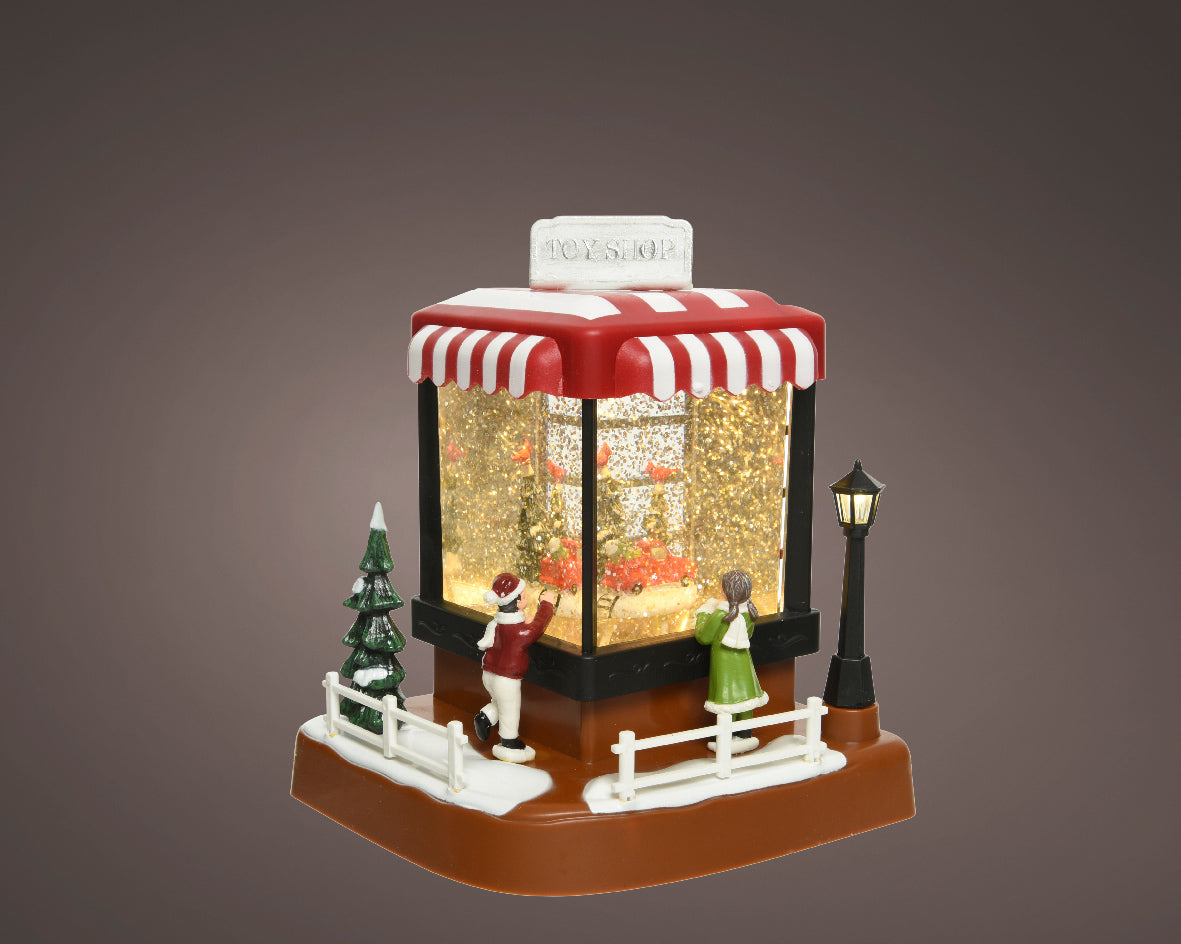 Musical snow globe in the shape of a Christmas tent