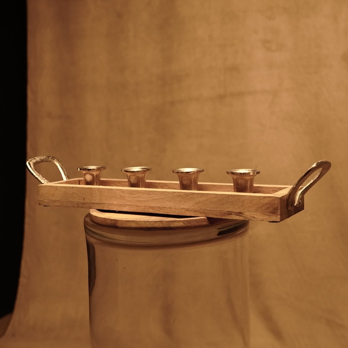 Candle holder made of mango wood and chrome metal