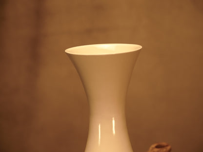 White concave ceramic vase