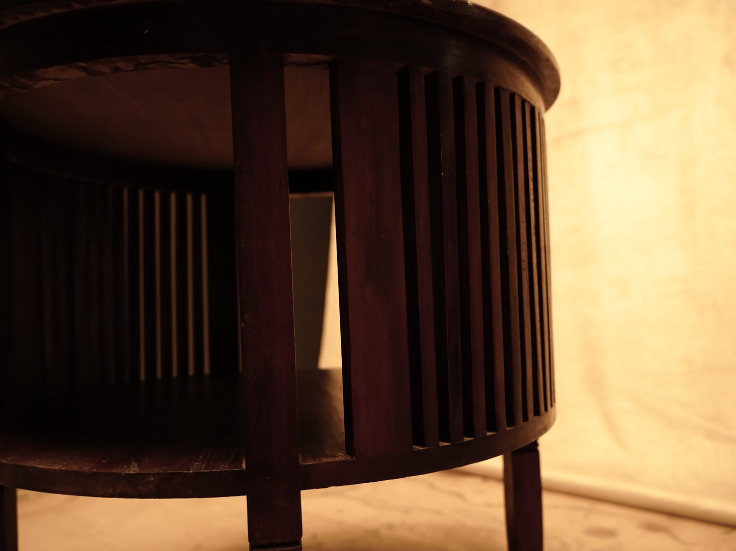 Round teak wood side table with dark shellac colonial style