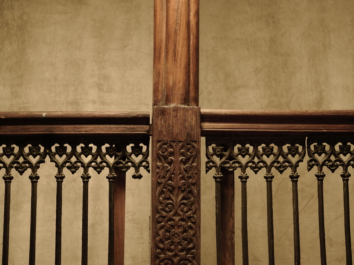 Carved wooden cornice and columns with wrought iron railing, Indonesian handicraft