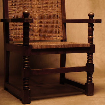 Antique chair made of natural wood with braided seat