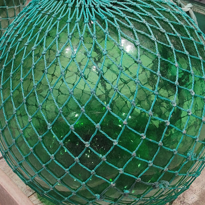 Green glass buoy recovered from La Santa