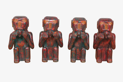 Figura de mono tribal en madera tallada roja